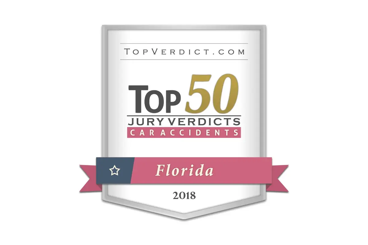 'TopVerdict.com' award for 'Top 50 Jury Verdicts Car Accidents Florida 2018'.