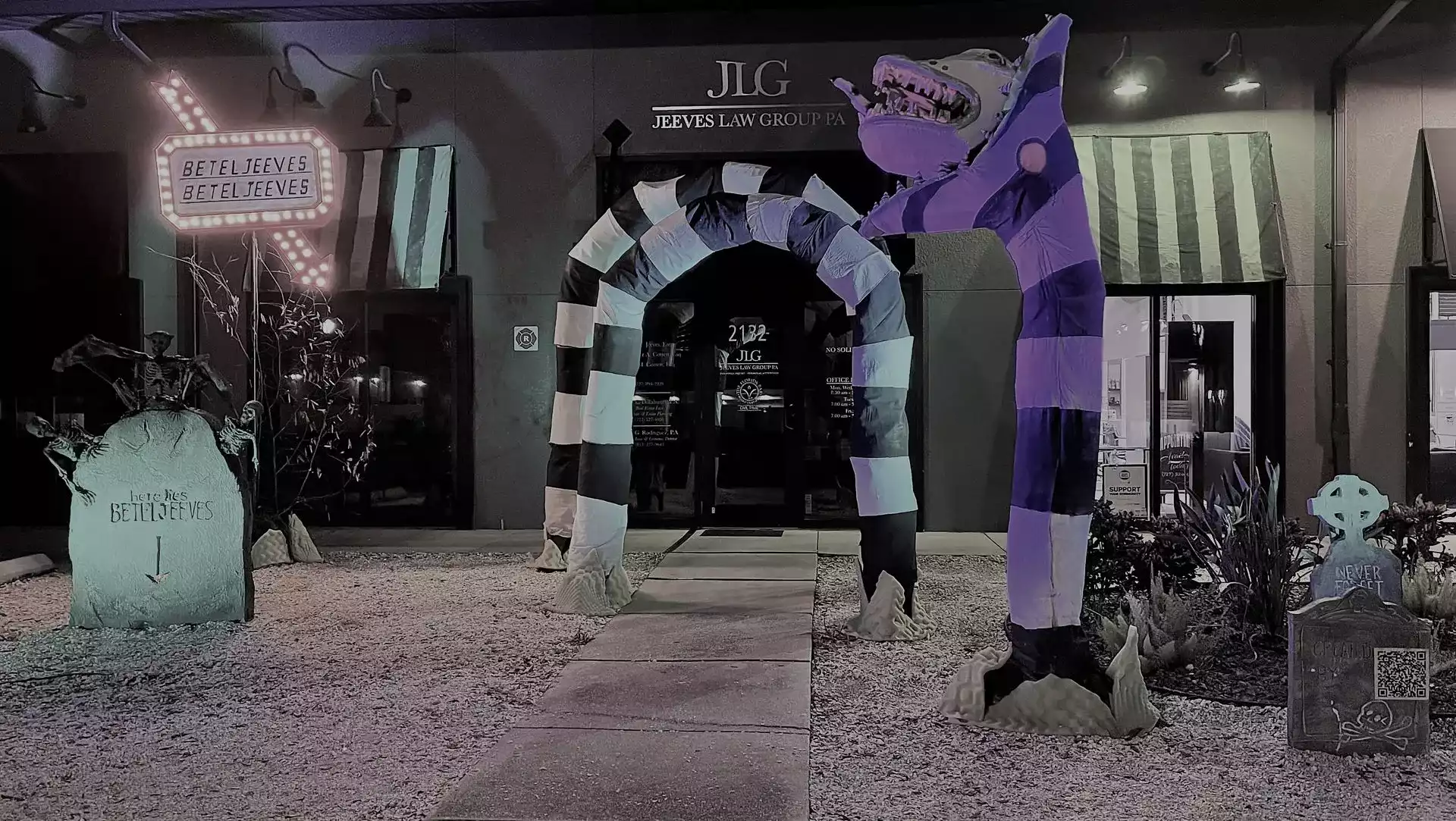 Jeeves Law Group office decorated with 'Beteljeeves' themes, a striped arch, and a purple monster.