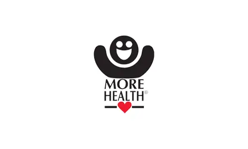 'More Health' logo with a smiling figure and a red heart below it.